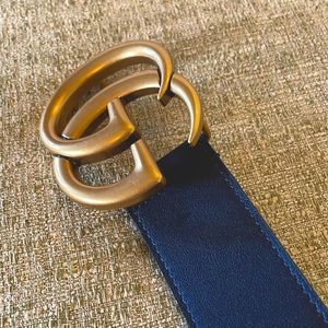 Relishing this authentic Gucci leather belt.